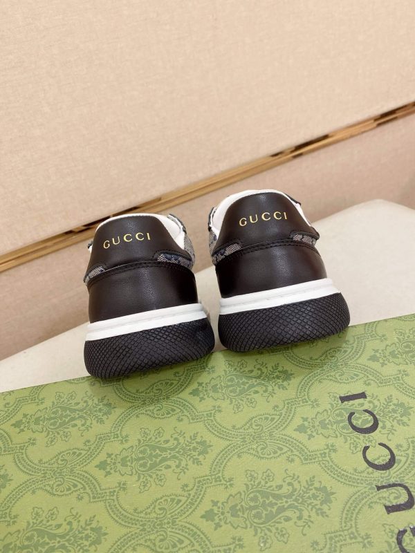 GucciRhytonSneakers_8_0e468d7d-1ed8-40ac-91e0-747f2df2ae4a Gucci Men's GG Trainer in Beige and Blue GG Canvas and Black Leather