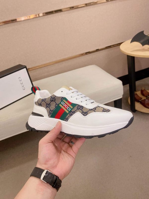 GucciRhytonsneaker_6_7d15efea-875d-4c7f-b00e-f3fa3b212c1b (1) Gucci Rhyton Trainer in Blue and Beige Supreme Canvas and White Leather