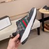 GucciRhytonsneakerfeaturingthebrand_ssignatureGGmotifandredandgreenwebstripe._3 Gucci Trainer in Blue and Beige Supreme Canvas and Black Leather