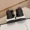 GucciRhytonsneakerfeaturingthebrand_ssignatureGGmotifandredandgreenwebstripe._5 Gucci Trainer in Blue and Beige Supreme Canvas and Black Leather