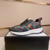 GucciRhytonsneakerfeaturingthebrand_ssignatureGGmotifandredandgreenwebstripe._8 Gucci Trainer in Blue and Beige Supreme Canvas and Black Leather
