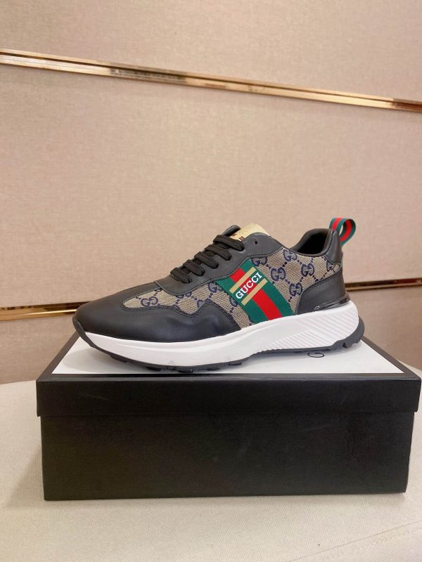 GucciRhytonsneakerfeaturingthebrand_ssignatureGGmotifandredandgreenwebstripe._8 Gucci Trainer in Blue and Beige Supreme Canvas and Black Leather