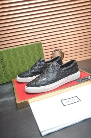 GucciSlipOn_1_c915b73c-98c1-4f28-ab61-15e0b19578b5 Gucci Men's GG Leather Slip-On Sneaker in Black