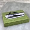 Gucci Black and White Thong Sandals with Double G