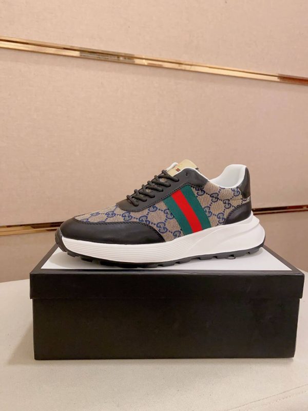 Guccisneakerfeaturingthebrand_siconicGGmonogramcanvas_withagreenandredwebstripeontheside._5 Gucci Blue Brown GG Canvas Re-Motion Trainers