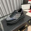 Gucci Runner Sneaker in Black Leather and Beige GG Supreme Canvas