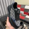 Gucci Runner Sneaker in Black Leather and Beige GG Supreme Canvas