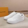 LOUIS VUITTON Rivoli Sneaker in White Monogram Debossed Leather