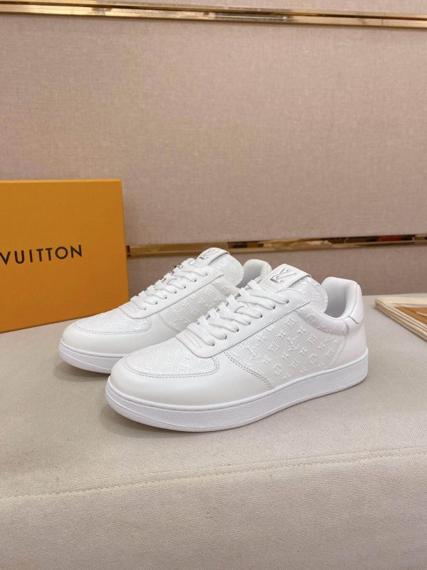 LOUIS VUITTON Rivoli Sneaker in White Monogram Debossed Leather