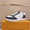 LOUIS VUITTON Rivoli Sneaker in White Monogram Debossed Leather and Black Smooth Leather
