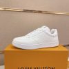 LOUIS VUITTON Rivoli Sneaker in White Monogram Debossed Leather