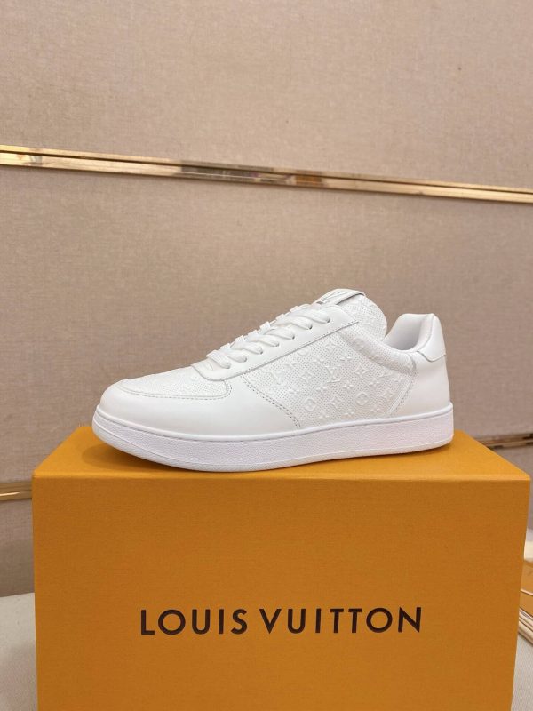 LOUIS VUITTON Rivoli Sneaker in White Monogram Debossed Leather