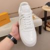 LOUIS VUITTON Rivoli Sneaker in White Monogram Debossed Leather