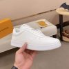 LOUIS VUITTON Rivoli Sneaker in White Monogram Debossed Leather
