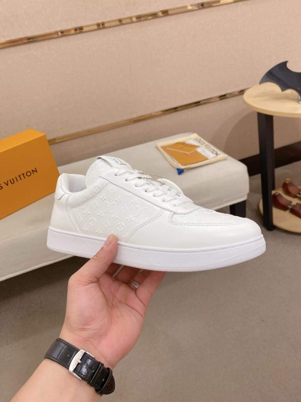 LOUIS VUITTON Rivoli Sneaker in White Monogram Debossed Leather