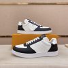 LOUIS VUITTON Rivoli Sneaker in White Monogram Debossed Leather and Black Smooth Leather