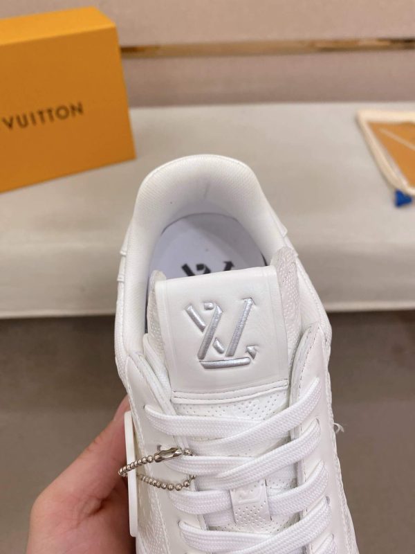 LOUIS VUITTON Rivoli Sneaker in White Monogram Debossed Leather