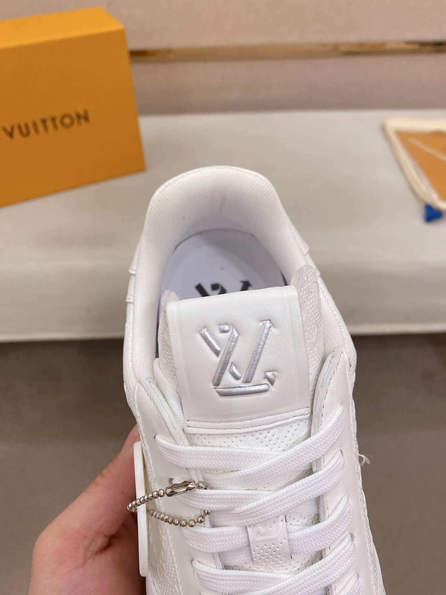 LOUIS VUITTON Rivoli Sneaker in White Monogram Debossed Leather 5 LOUIS VUITTON Rivoli Sneaker in White Monogram Debossed Leather - Image 5