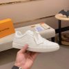 LOUIS VUITTON Luxembourg Sneaker in White Monogram Embossed Leather