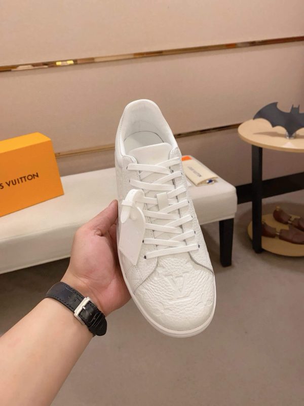 LOUIS VUITTON Luxembourg Sneaker in White Monogram Embossed Leather
