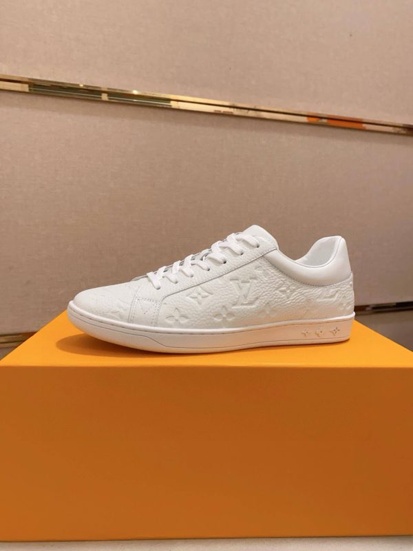 LOUIS VUITTON Luxembourg Sneaker in White Monogram Embossed Leather