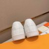 LOUIS VUITTON Luxembourg Sneaker in White Monogram Embossed Leather