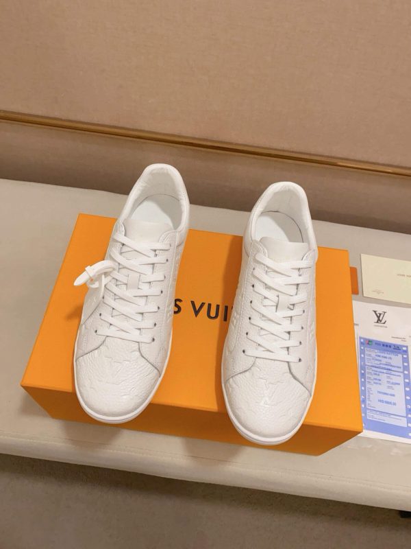 LOUIS VUITTON Luxembourg Sneaker in White Monogram Embossed Leather