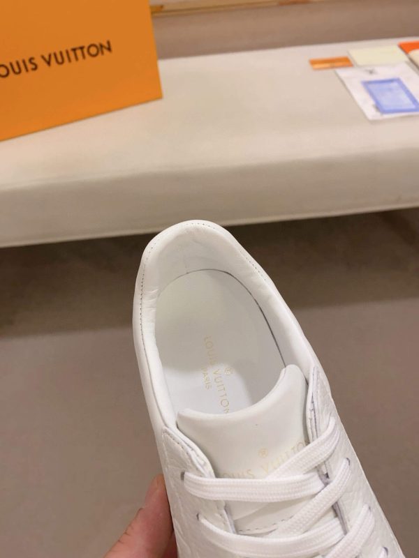 LOUIS VUITTON Luxembourg Sneaker in White Monogram Embossed Leather