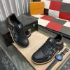 Louis Vuitton LV Trainer Sneaker in Black Monogram Denim and White Leather