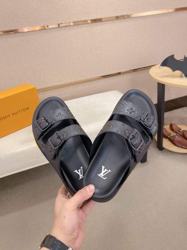 LouisVuittonslidesandals_featuringthebrand_ssignaturemonogrampatternonthestraps_6_fc12eff6-d2f3-49a9-b2a3-71f12b28f6e1 LV Venice Mule in Black Monogram Embossed Leather