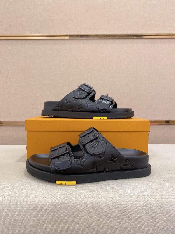 LouisVuittonslidesandals_featuringthebrand_ssignaturemonogrampatternonthestraps_9_9a1ab78a-2b6b-4ec0-a3bc-336086c65ba1 LV Venice Mule in Black Monogram Embossed Leather
