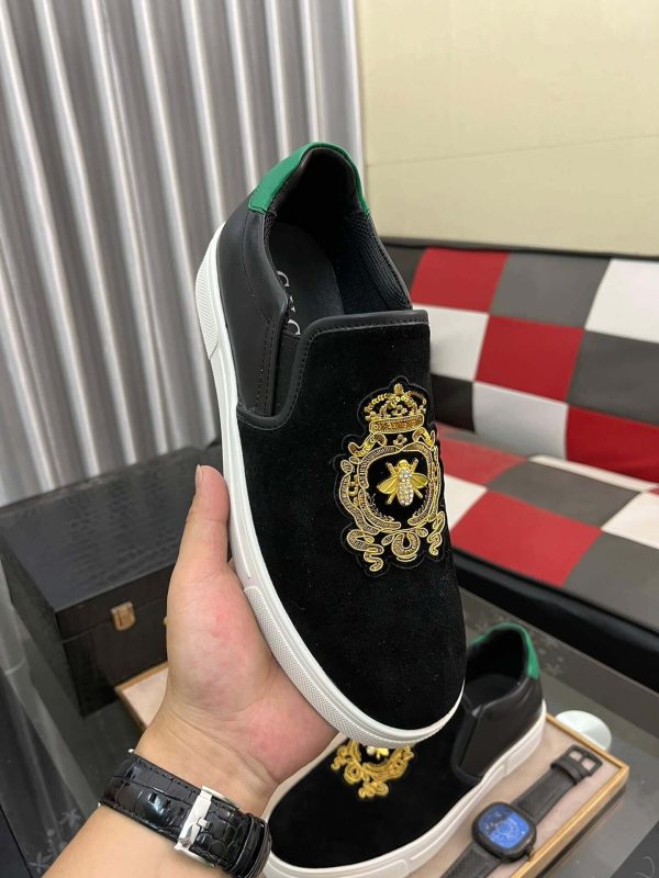Gucci Men's Slip-On Loafers with A Gold Embellished Crest Design