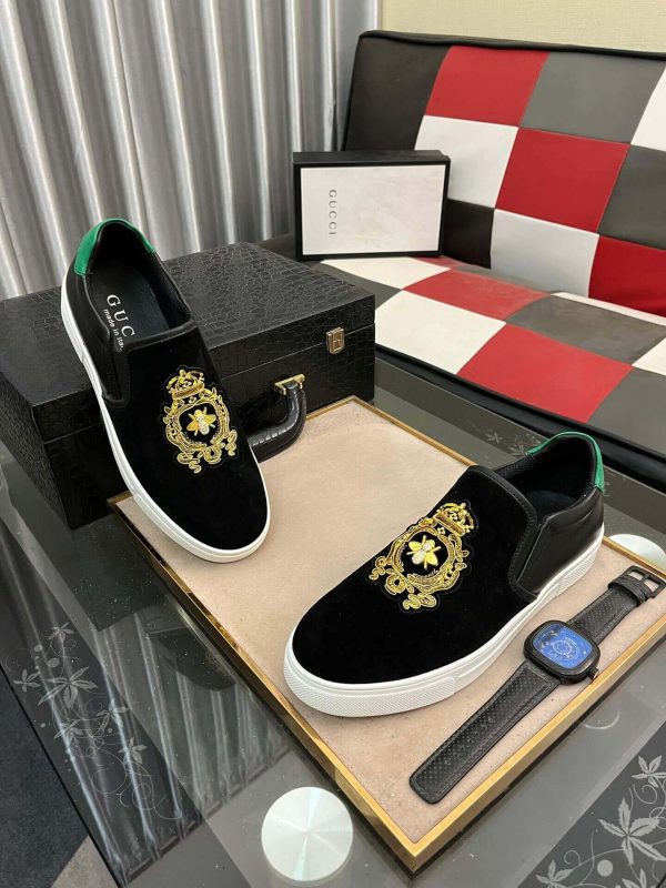 Gucci Men's Slip-On Loafers with A Gold Embellished Crest Design