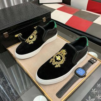 Gucci Men's Slip-On Loafers with A Gold Embellished Crest Design
