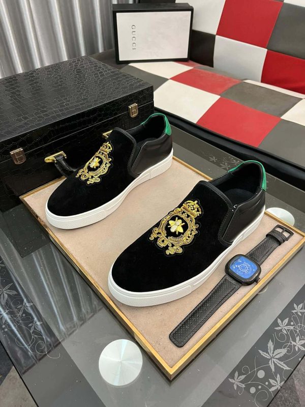Gucci Men's Slip-On Loafers with A Gold Embellished Crest Design