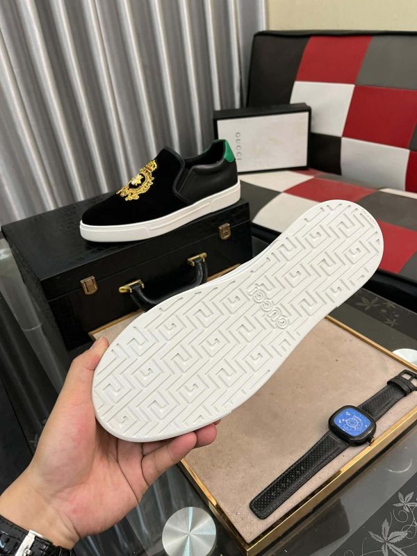 Gucci Men's Slip-On Loafers with A Gold Embellished Crest Design