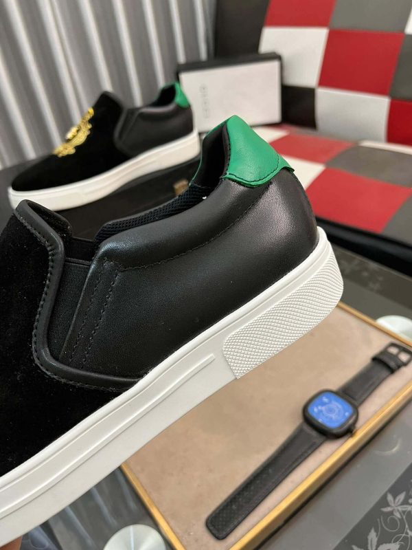 Gucci Men's Slip-On Loafers with A Gold Embellished Crest Design