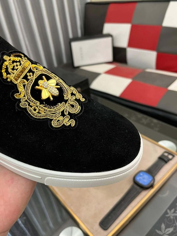 Gucci Men's Slip-On Loafers with A Gold Embellished Crest Design