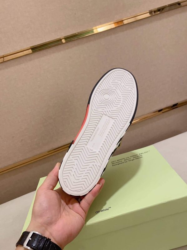 Off-WhiteNewLowVulcanizedsneakerinablackandyellowcolorway._6 Off-White Floating Arrow Low Vulcan Leather Sneaker in Black/Grey/Yellow