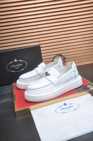 Prada Ivory Leather Platform Loafers with Enamel Triangle Logo