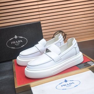 Prada Ivory Leather Platform Loafers with Enamel Triangle Logo
