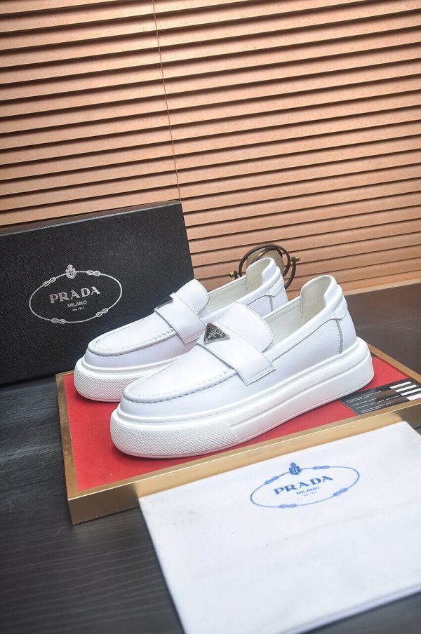 Prada Ivory Leather Platform Loafers with Enamel Triangle Logo