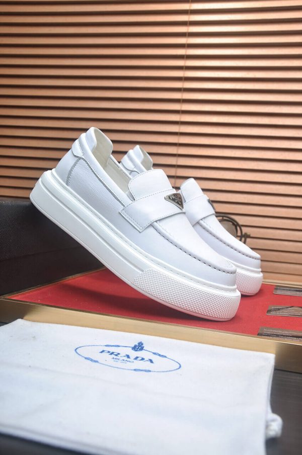 Prada Ivory Leather Platform Loafers with Enamel Triangle Logo