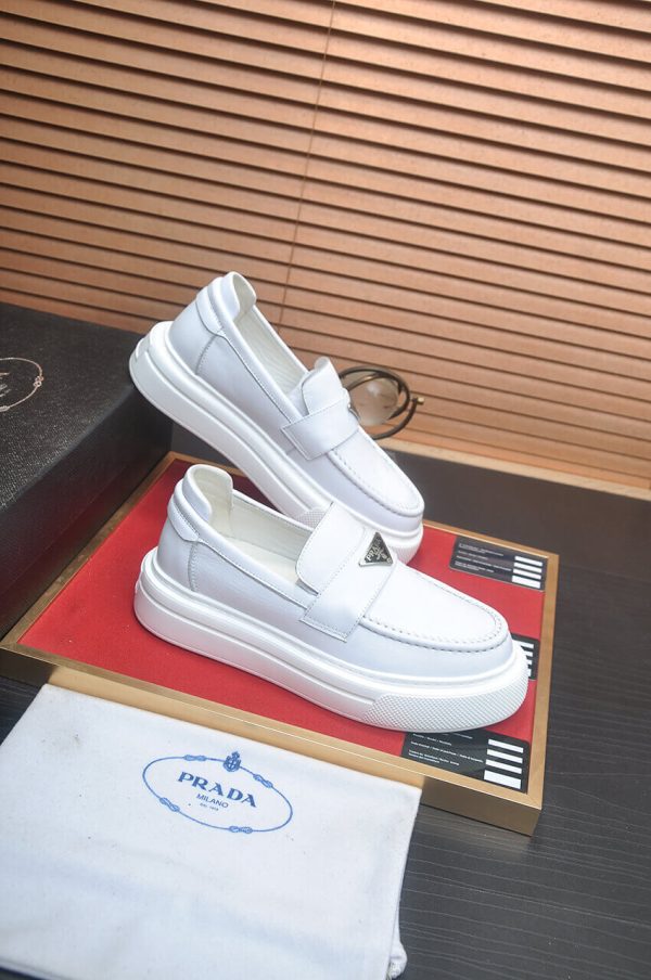 Prada Ivory Leather Platform Loafers with Enamel Triangle Logo