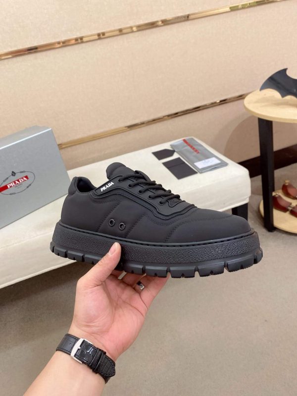 PradaDowntownLeatherSneakers_2_042006fc-a46d-4f4d-a868-075c964d58fa Prada Black Re-Nylon Sneakers