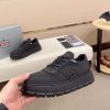 PradaDowntownLeatherSneakers_3_7653adf4-bbc1-4fb0-891d-648cc80d197a Prada Black Re-Nylon Sneakers