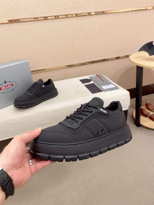 PradaDowntownLeatherSneakers_3_7653adf4-bbc1-4fb0-891d-648cc80d197a Prada Black Re-Nylon Sneakers