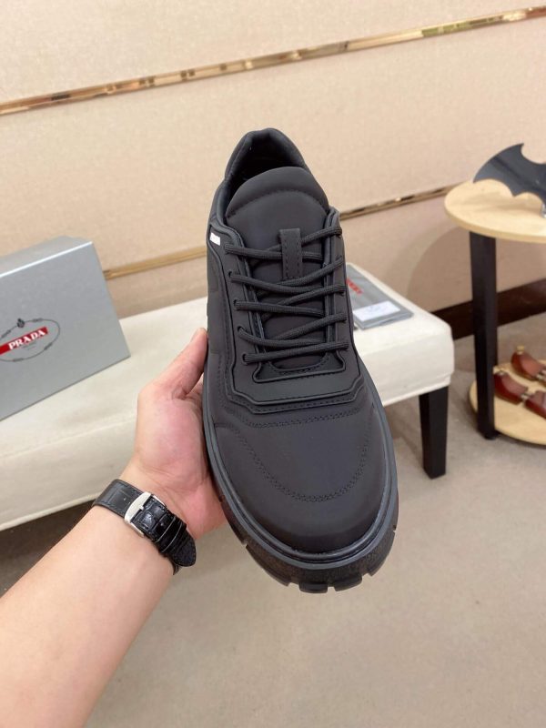 PradaDowntownLeatherSneakers_4_0e4fe413-9886-43cf-9a7a-9bdd6bc496ba Prada Black Re-Nylon Sneakers