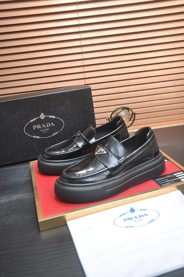 Prada Black Polished Leather Platform Loafers with Enamel Triangle Logo