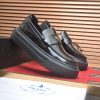 Prada Black Polished Leather Platform Loafers with Enamel Triangle Logo